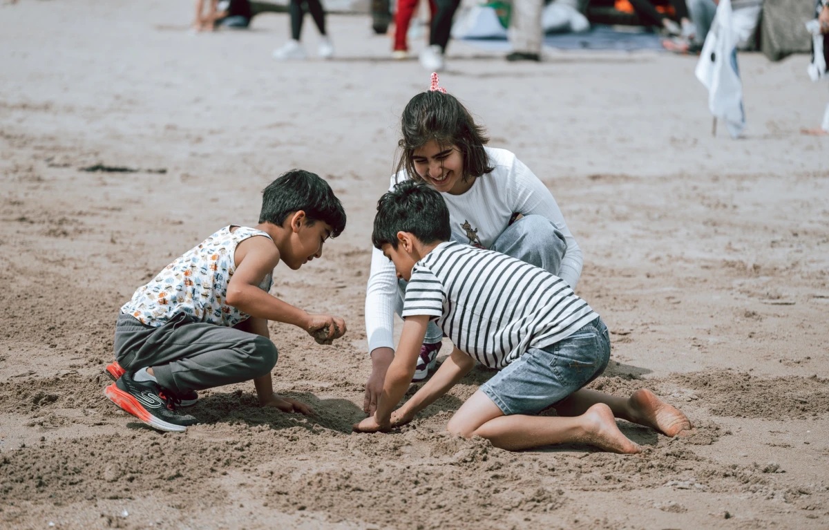 Children playing on the sand